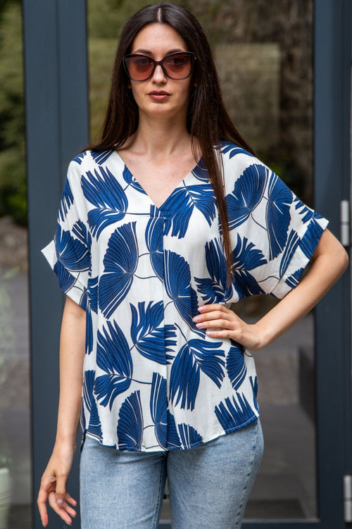 Women's blouse with a palm leaf print