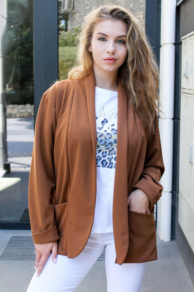 Solid-colour women's blazer with pockets