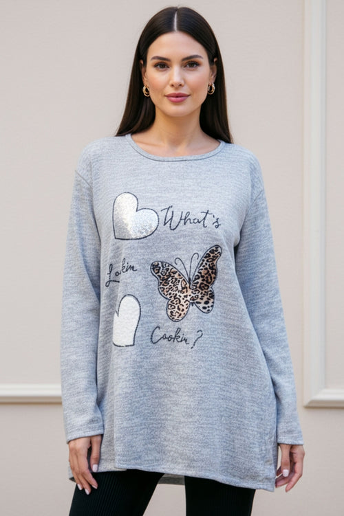 Plus-size women's blouse with butterfly and heart prints