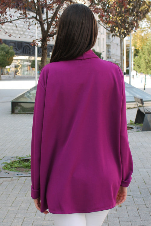 Solid-colour women's blazer with pockets
