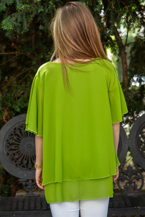 Plain plus-size women's blouse with complimentary accessory