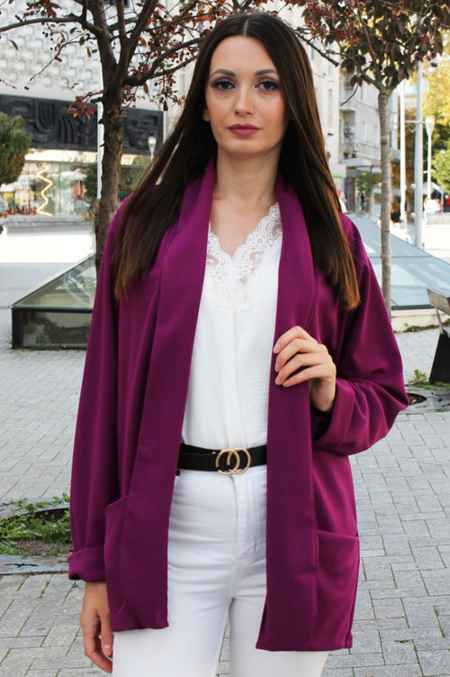 Solid-colour women's blazer with pockets