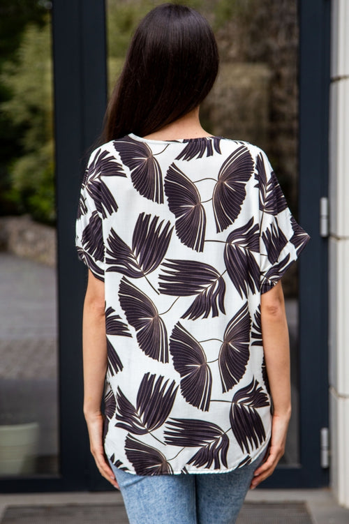 Women's blouse with a palm leaf print