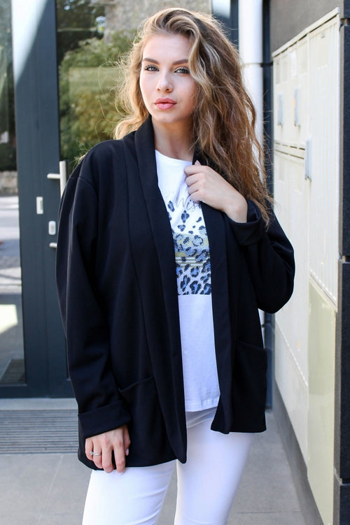 Solid-colour women's blazer with pockets