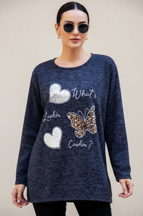 Plus-size women's blouse with butterfly and heart prints