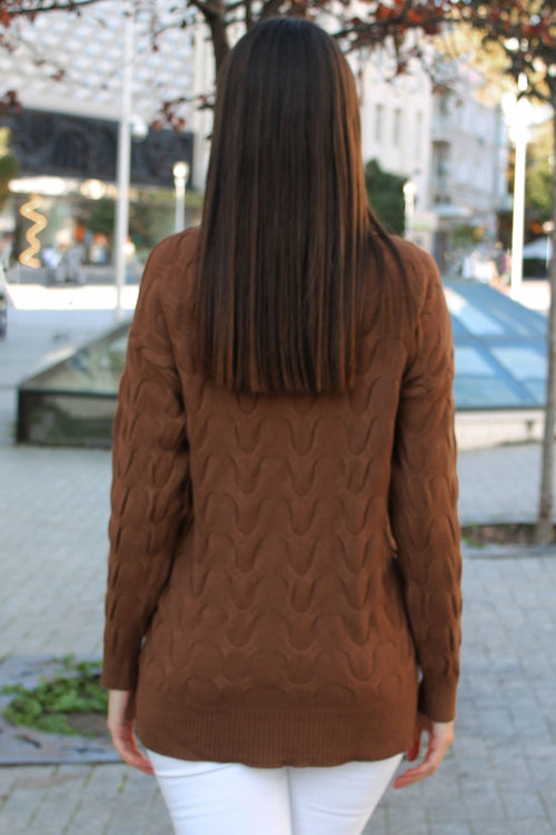 Women's turtleneck sweater with striking cable knit