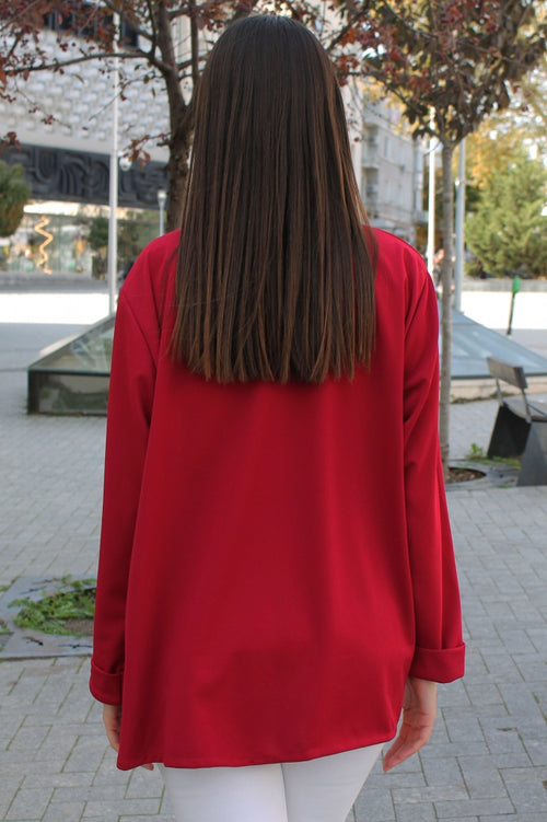 Solid-colour women's blazer with pockets