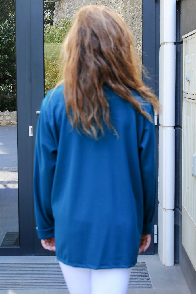 Solid-colour women's blazer with pockets