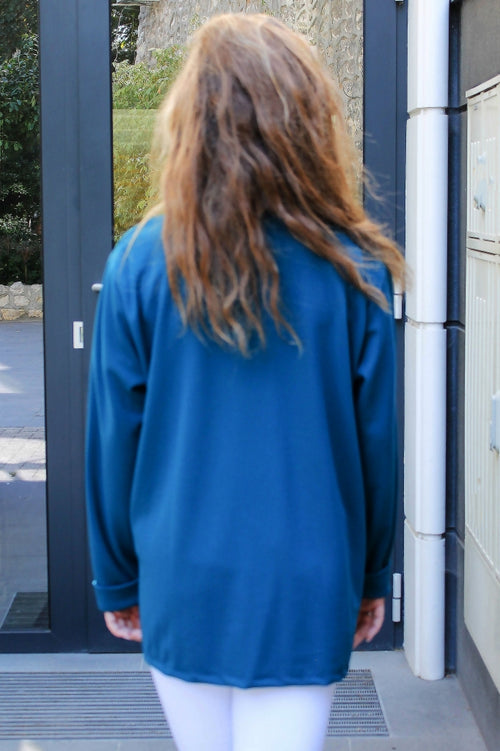 Solid-colour women's blazer with pockets