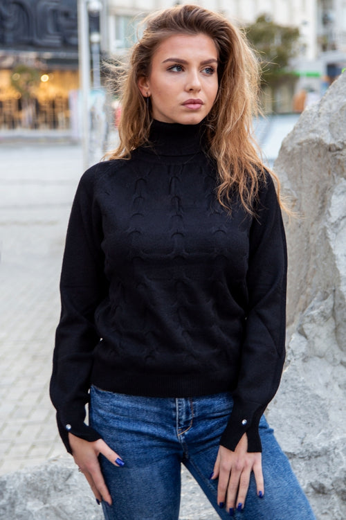 Turtleneck sweater with cable knit and diamond fastenings