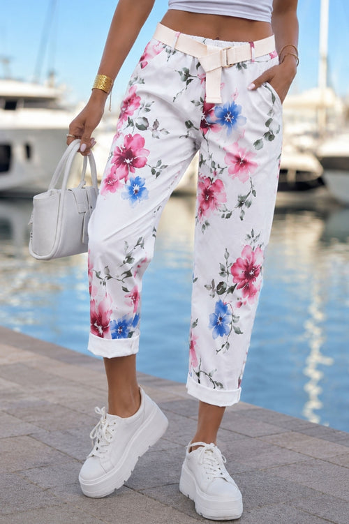 Stretch women's trousers with large floral motifs