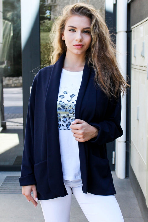Solid-colour women's blazer with pockets