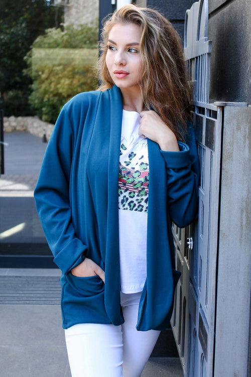 Solid-colour women's blazer with pockets