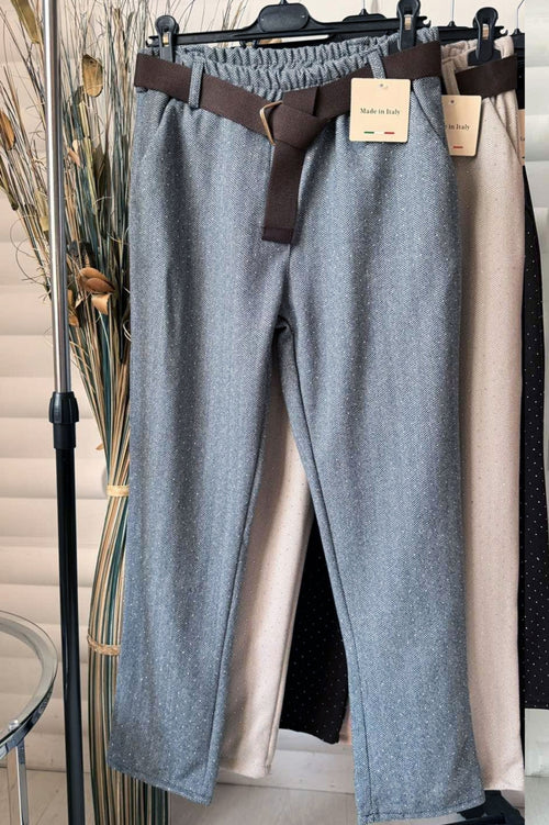 Pantaloni moderni de damă cu capse mici