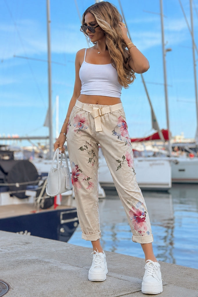 Stretch women's trousers with large floral motifs
