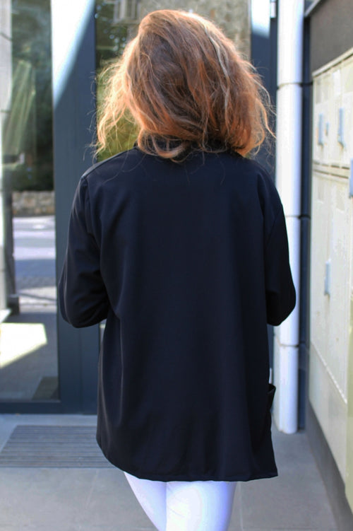 Solid-colour women's blazer with pockets