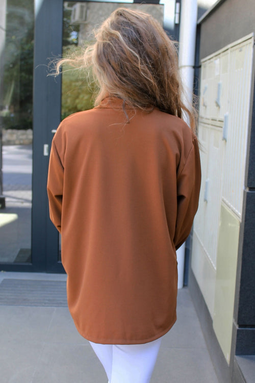Solid-colour women's blazer with pockets