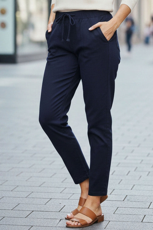 Едноцветен еластичен панталон с ластик на талията