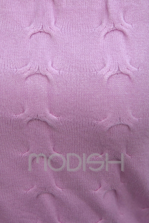 Turtleneck sweater with cable knit and diamond fastenings